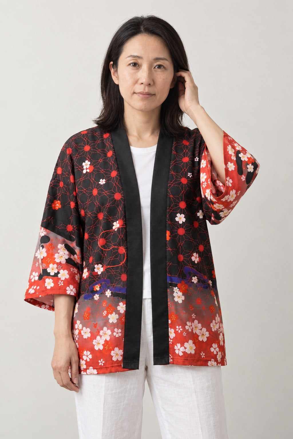 Kitsune Fox Kimono Jacket 'Shirogitsune' – red and black women's kimono jacket with white kitsune fox mask and cherry blossom print, Japanese haori style cardigan, front view on model