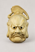 Large Wooden Folk Mask 'Oomen' – large unpainted wooden folk mask of a scowling man with topknot, long ears and moustache, hand carved wooden Japanese mask for the wall, studio view