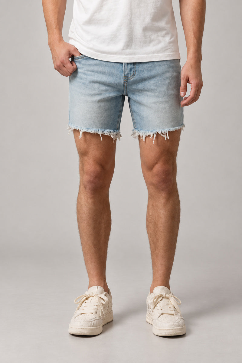 Light Wash Cut Off Denim Shorts 'Kirippa' – light wash cut off denim shorts with frayed raw hem, Japanese streetwear shorts, front view on model
