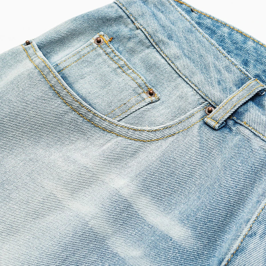 Light Wash Cut Off Denim Shorts 'Kirippa' – close-up detail of the light wash waistband and pocket