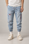 Light Wash Denim Joggers 'Usuai' – light wash denim joggers with cargo pocket and cuffed hem, Japanese streetwear jeans, front view on model