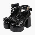 Lolita Shoes 'Yamiko' – black patent platform Mary Jane shoes with crossed ankle straps, bows and star buckle, Japanese lolita shoes, studio view