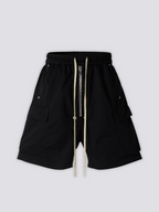 Long Black Cargo Shorts 'Kurokage' – flat lay front view of the long black cargo shorts