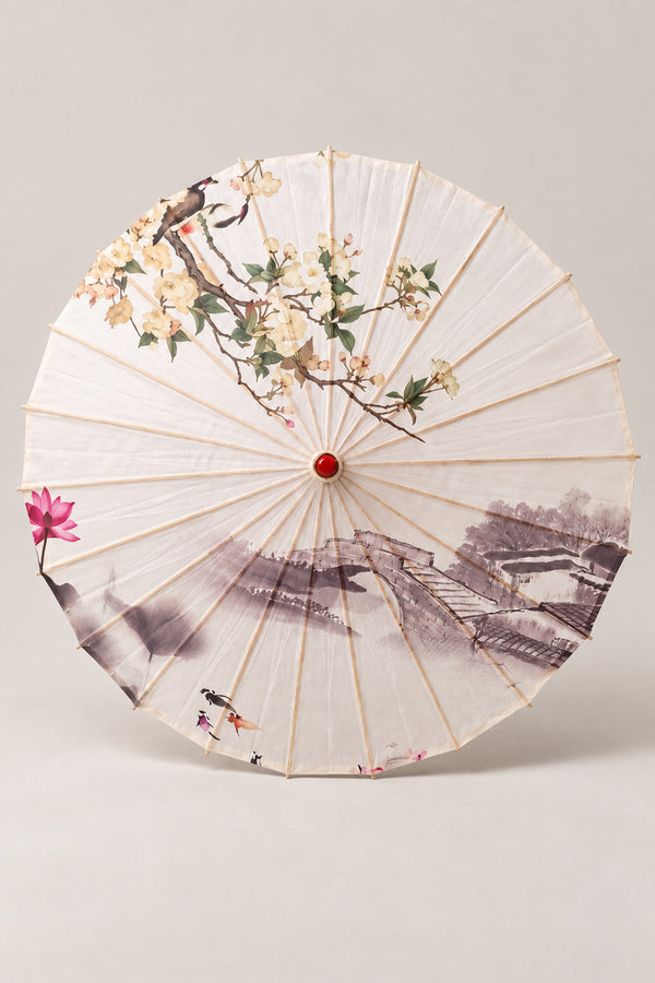 Lotus Bridge Japanese Umbrella 'Hasuhashi' – white parasol printed with an ink wash landscape of a bridge, willows and a lotus, Japanese wagasa parasol with wooden frame and paper-effect canopy, open, studio view