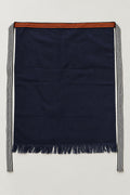 Maekake – plain indigo maekake waist apron with fringed hem and striped ties, traditional Japanese sake brewery waist apron with fringed hem, studio view