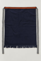 Maekake – plain indigo maekake waist apron with fringed hem and striped ties, traditional Japanese sake brewery waist apron with fringed hem, studio view