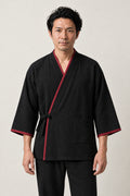 Men's Black Crimson Trim Jinbei 'Kurobeni' – black men's jinbei with crimson red trim, two-piece Japanese jinbei set with side-tie top and shorts, front view on model