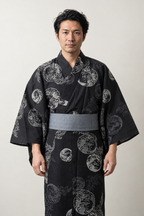 Men's Black Wave Yukata 'Shiranami' – black men's yukata with grey circular wave crest print and grey obi belt, Japanese kimono robe, front view on model