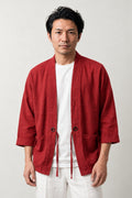 Men's Brick Kimono Jacket 'Benigara' – brick red men's kimono jacket with front tie and patch pockets, Japanese noragi haori style cardigan, front view on model