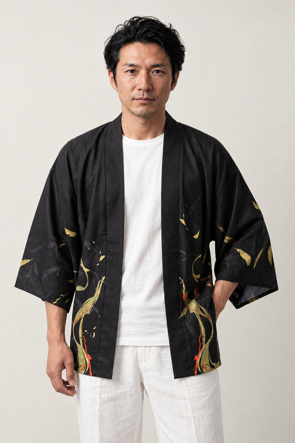 Men's Ember Print Kimono Jacket 'Hinoko' – black men's kimono jacket with orange ember and flame print, three-quarter sleeve haori style, front view on model