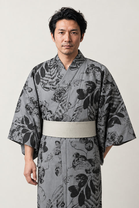 Men's Grey Floral Yukata 'Sumibana' – grey men's yukata with tonal black floral print and grey obi belt, Japanese kimono robe, front view on model