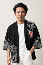 Men's Hannya Haori Jacket 'Kijo' – black men's haori jacket with white line hannya mask and dragon print, Japanese kimono style cardigan, front view on model
