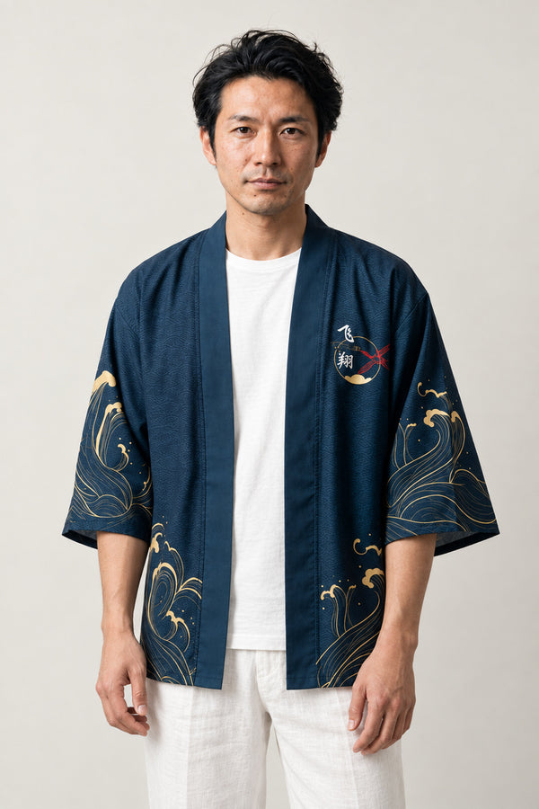 Men's Indigo Haori Coat 'Kamado' – indigo men's haori coat with subtle crane and wave print, Japanese kimono style jacket, front view on model
