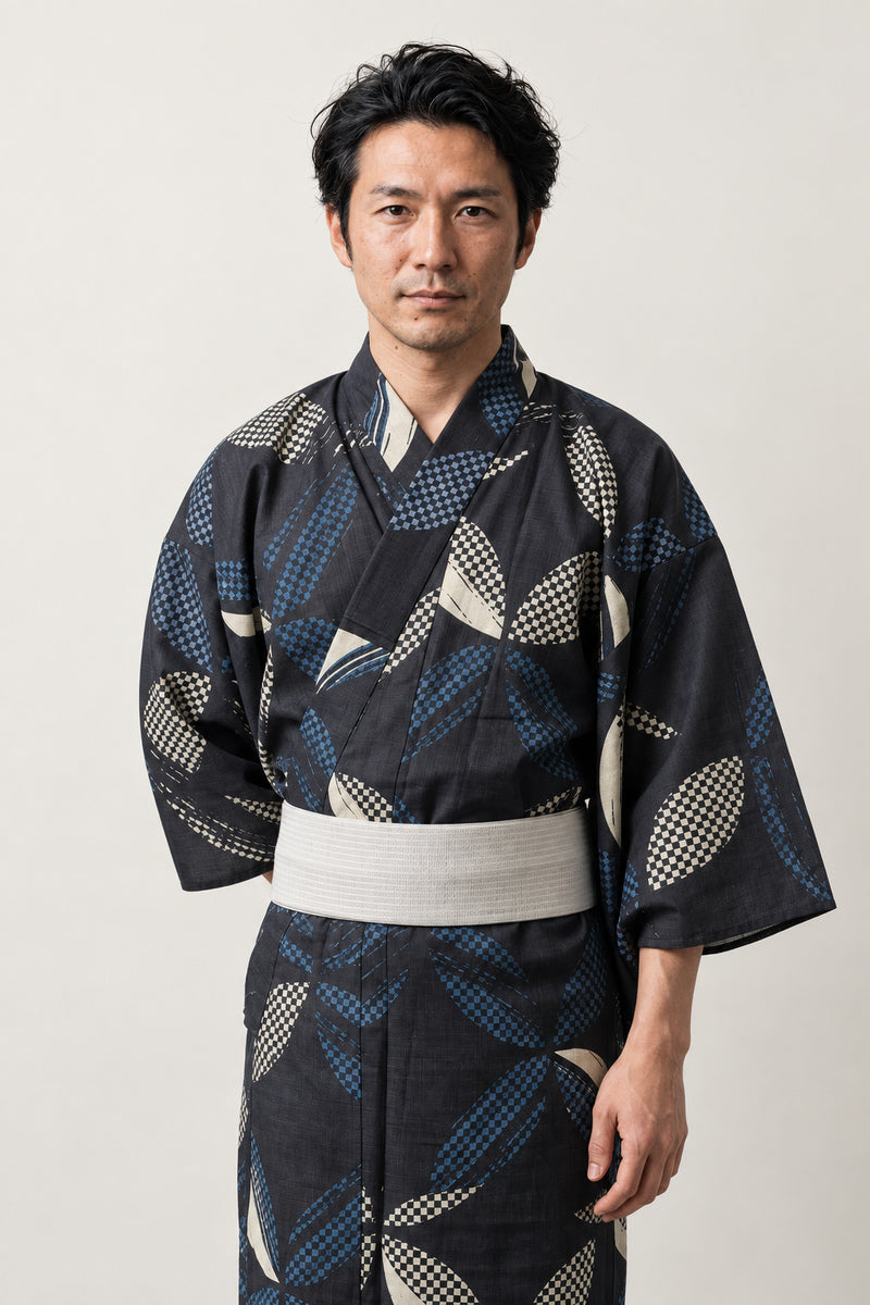 Men's Large Leaf Kimono 'Hiroha' – black men's kimono with large blue leaf print and cream obi belt, Japanese yukata robe, front view on model