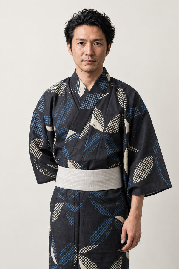 Men's Large Leaf Kimono 'Hiroha' – black men's kimono with large blue leaf print and cream obi belt, Japanese yukata robe, front view on model