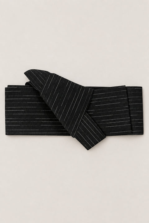 Men's Obi Belt 'Ginsuji' – black obi belt with fine silver pinstripes, narrow pre-tied Japanese obi belt with sewn knot and hidden adjustable closure, for kimono, yukata or jinbei, studio view