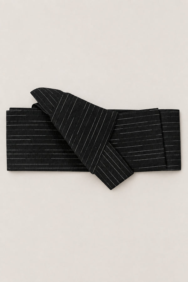 Men's Obi Belt 'Ginsuji' – black obi belt with fine silver pinstripes, narrow pre-tied Japanese obi belt with sewn knot and hidden adjustable closure, for kimono, yukata or jinbei, studio view