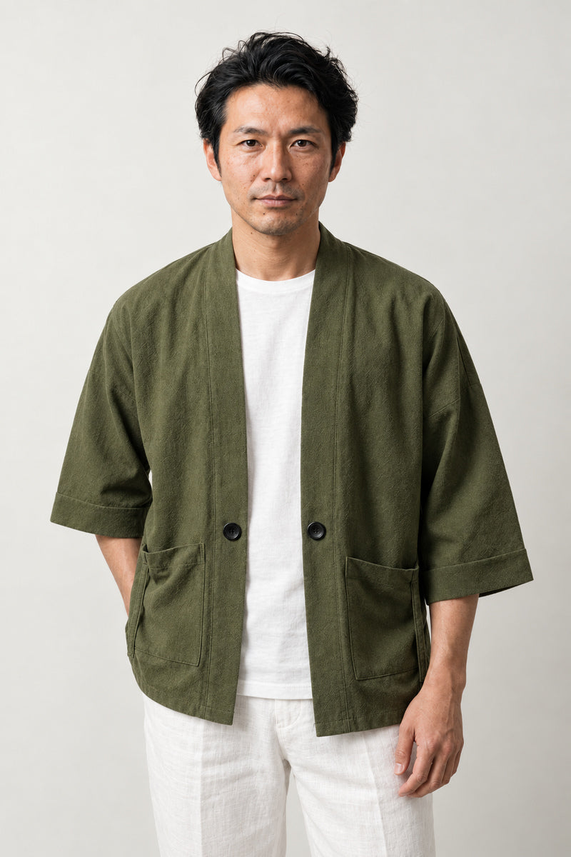 Men's Olive Utility Kimono Jacket 'Uguisu' – olive green men's utility kimono jacket with patch pockets and toggle, Japanese noragi style cardigan, front view on model