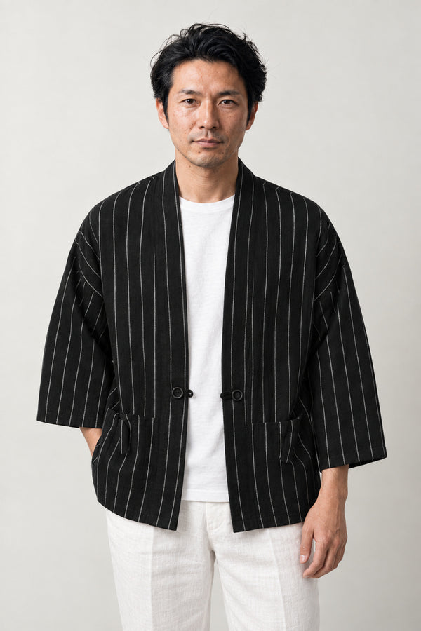 Men's Pinstripe Kimono Jacket 'Sensuji' – black pinstripe men's kimono jacket with front pockets, Japanese haori style cardigan, front view on model