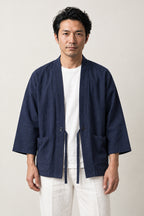 Men's Solid Navy Kimono Jacket 'Kachi-iro' – plain navy blue men's kimono jacket with front tie and pockets, Japanese haori style cardigan, front view on model