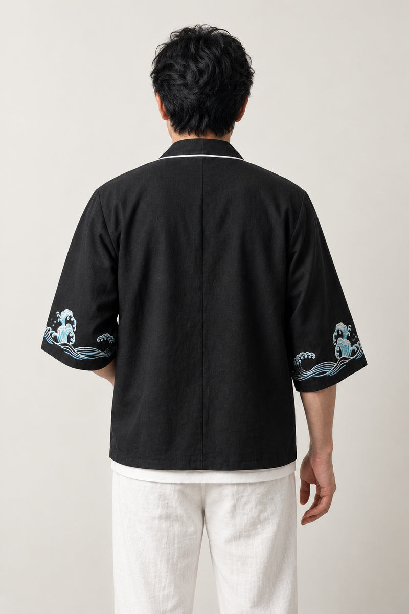 Men's Wave Trim Kimono Jacket 'Aranami' – back view of black kimono jacket with Japanese wave print on the sleeves and white piping