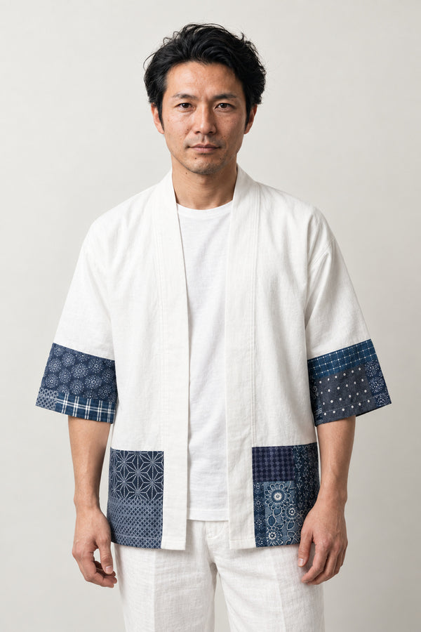 Men's White Patchwork Kimono Jacket 'Aizuri' – white men's kimono jacket with indigo boro patchwork print hem and cuffs, Japanese haori style cardigan, front view on model