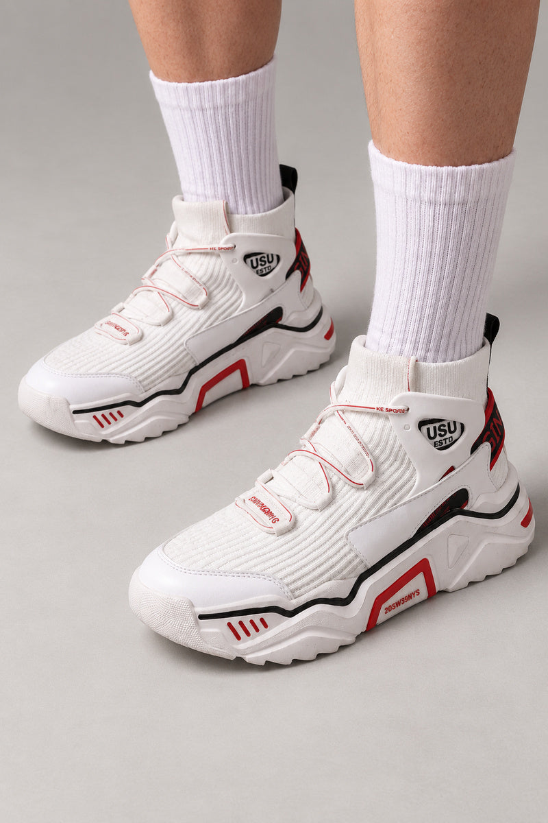 Mid Top Japanese Sneakers 'Nakaba' – white mid top sneakers with knit collar and red detailing, Japanese streetwear sneakers worn with white socks, on model