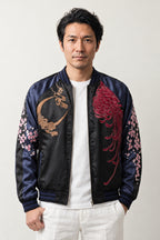 Moon and Blossom Sukajan 'Mikazuki' – black and navy sukajan with embroidered crescent moon and cherry blossom, Japanese sukajan souvenir bomber jacket, front view on model