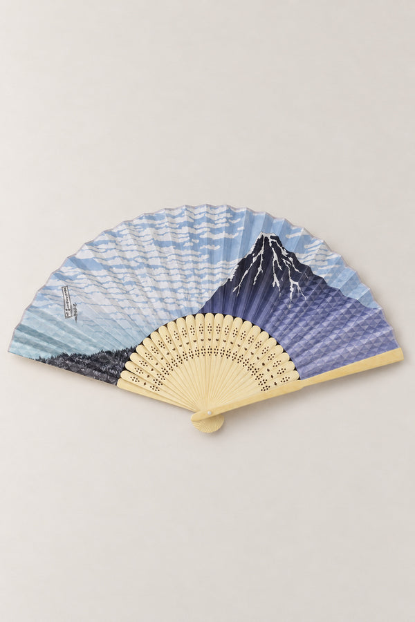 Mount Fuji Painted Fan 'Yukifuji' – folding fan printed with snow-capped Mount Fuji under a blue sky with clouds and a boat, Japanese folding sensu fan with bamboo ribs, open, studio view