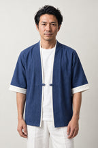 Navy Noragi Style Jacket 'Shokunin' – navy blue Japanese noragi jacket with cream trim and toggle, kimono style work jacket, unisex, front view on model