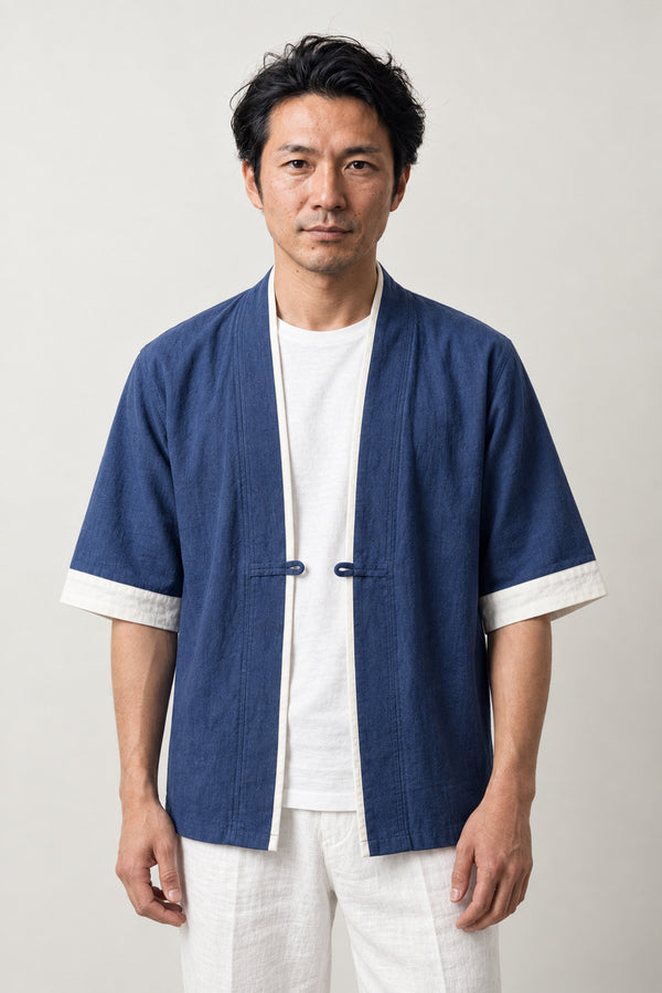 Navy Noragi Style Jacket 'Shokunin' – navy blue Japanese noragi jacket with cream trim and toggle, kimono style work jacket, unisex, front view on model