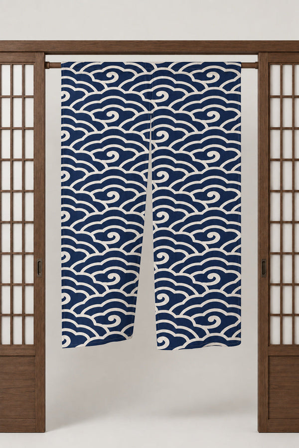 Navy Scroll Wave Noren 'Makinami' – navy noren with seigaiha wave pattern in white scrolling arcs, split Japanese noren door curtain hung on a rod between sliding screens, studio view