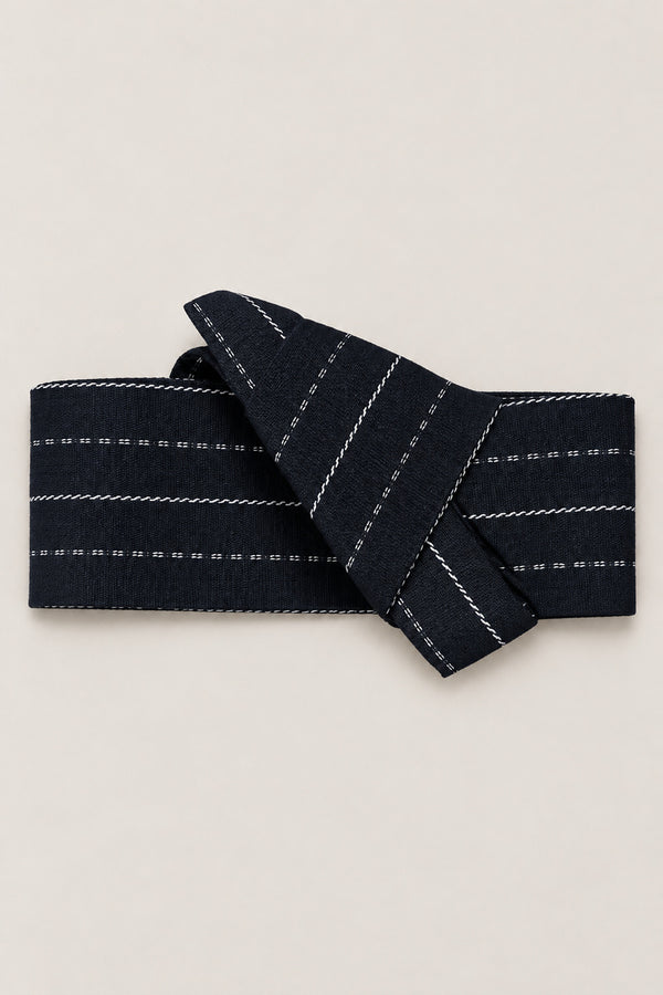 Navy Stripe Obi Belt 'Shirosuji' – navy obi belt with white stitched stripes, narrow pre-tied Japanese obi belt with sewn knot and hidden adjustable closure, for kimono, yukata or jinbei, studio view
