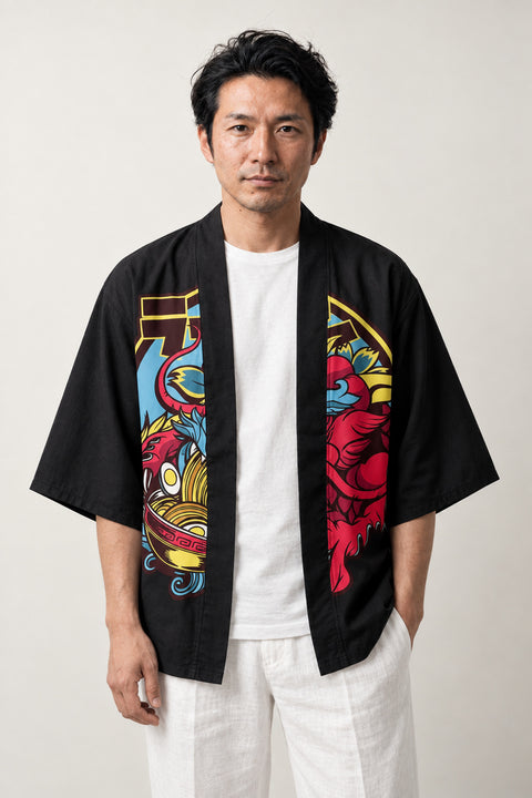 Oni Black Haori Jacket 'Kimon' – black haori jacket with colourful oni demon mask and torii gate print, unisex Japanese kimono style cardigan, front view on model