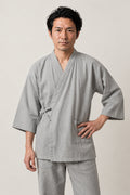 Pale Grey Japanese Nightwear 'Shironezu' – pale grey jinbei nightwear, unisex two-piece Japanese jinbei set with side-tie top and shorts, front view on model
