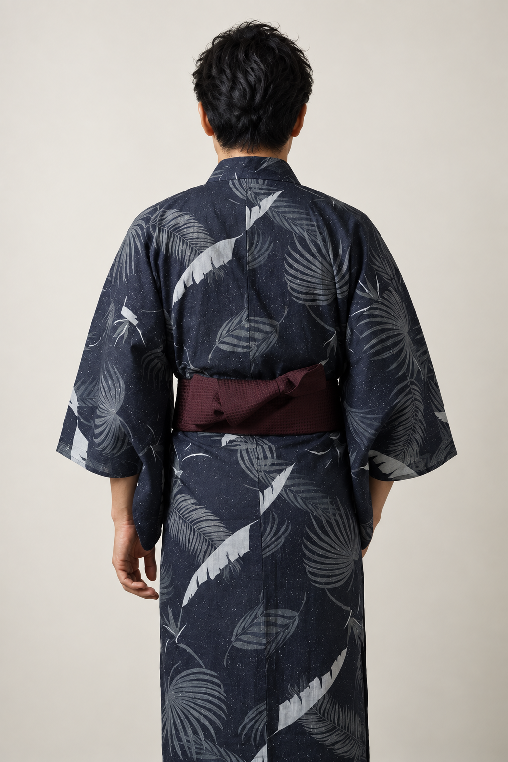 Palm Leaf Yukata 'Shuro' – back view of navy palm leaf print men's yukata with obi