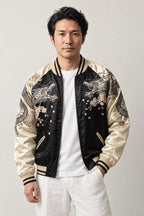 Phoenix and Moon Sukajan 'Tsukiakari' – black and cream sukajan with embroidered dragon and moon, Japanese sukajan souvenir bomber jacket, front view on model