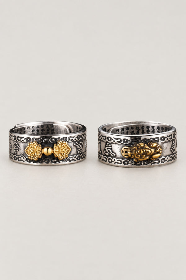 Pixiu Sutra Ring 'Hisho' – sterling silver band ring carved with clouds and set with a small gold winged lion, Japanese pixiu ring, studio view