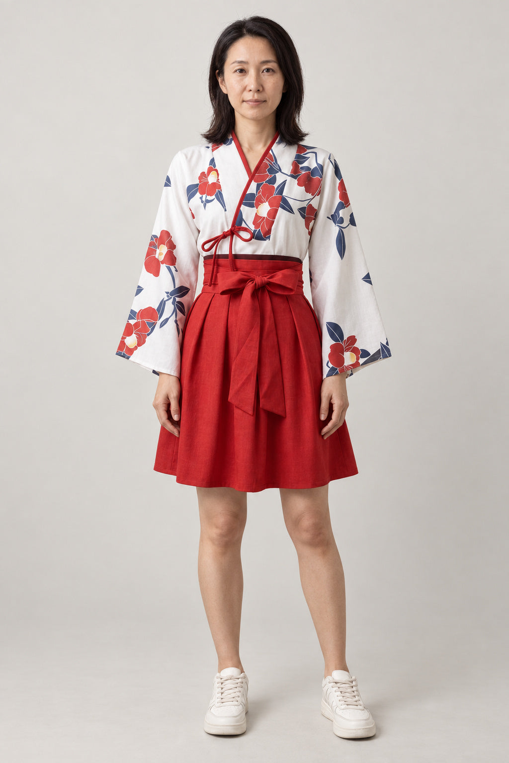 Pleated Kimono Mini Dress Set 'Wabisuke' – red skirt version of the camellia kimono top and pleated mini skirt set, front view on model