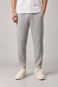 Pleated Straight Leg Trousers 'Hida' – light grey pleated straight leg trousers, Japanese streetwear pants, front view on model
