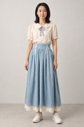 Powder Blue Peter Pan Collar Set 'Mizuasagi' – cream Peter Pan collar blouse and powder blue lace-up midi skirt, Japanese style two-piece outfit, front view on model