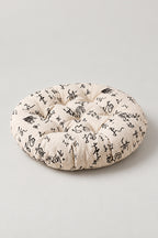 Printed Japanese Zabuton 'Garaza' – cream tufted round floor cushion with brushed calligraphy print, Japanese zabuton floor cushion, studio view