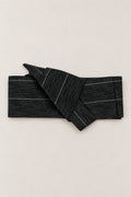 Rain Streak Obi Wrap Belt 'Harusame' – black obi belt with grey rain streak pattern, narrow pre-tied Japanese obi belt with sewn knot and hidden adjustable closure, for kimono, yukata or jinbei, studio view