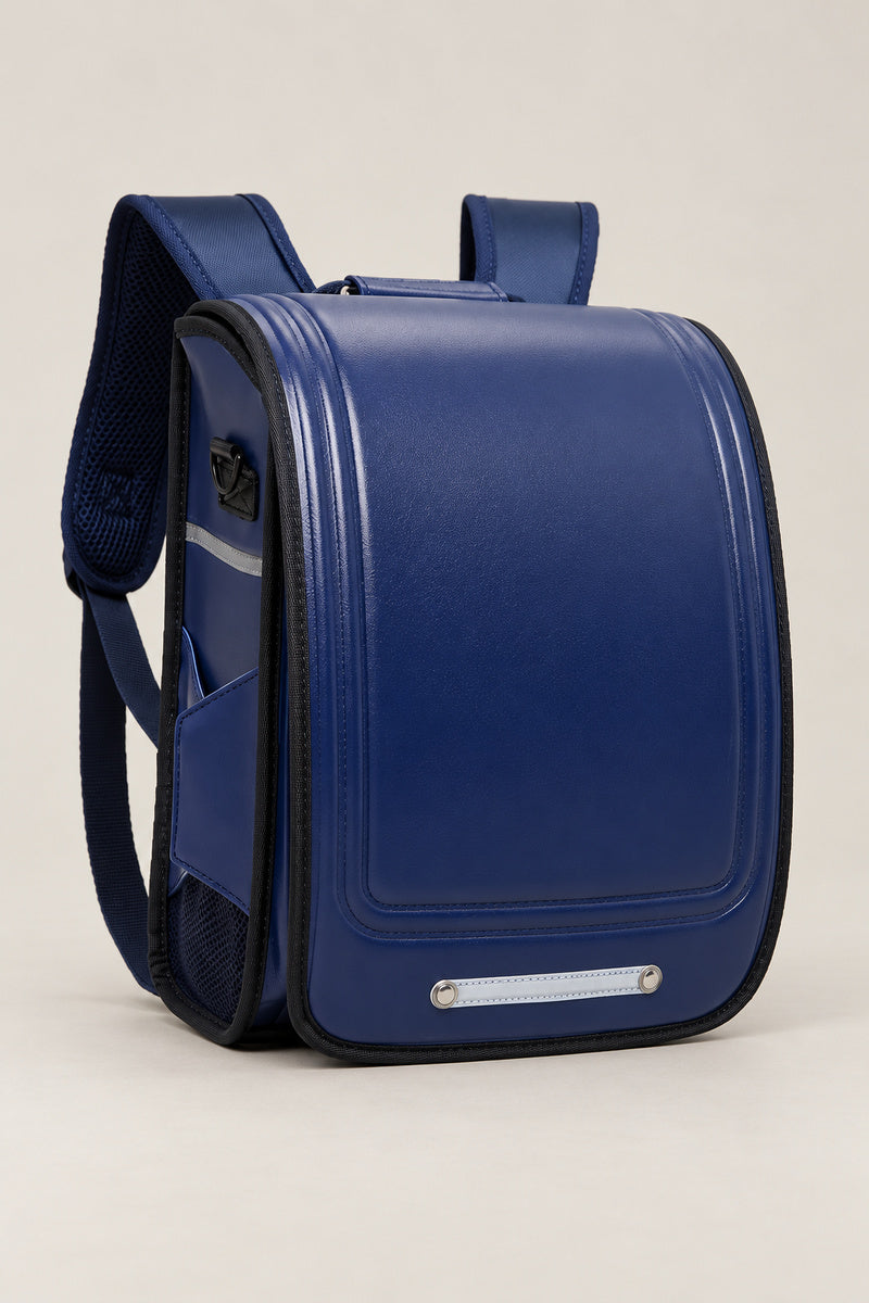 Randoseru – blue randoseru Japanese school backpack, front view, studio