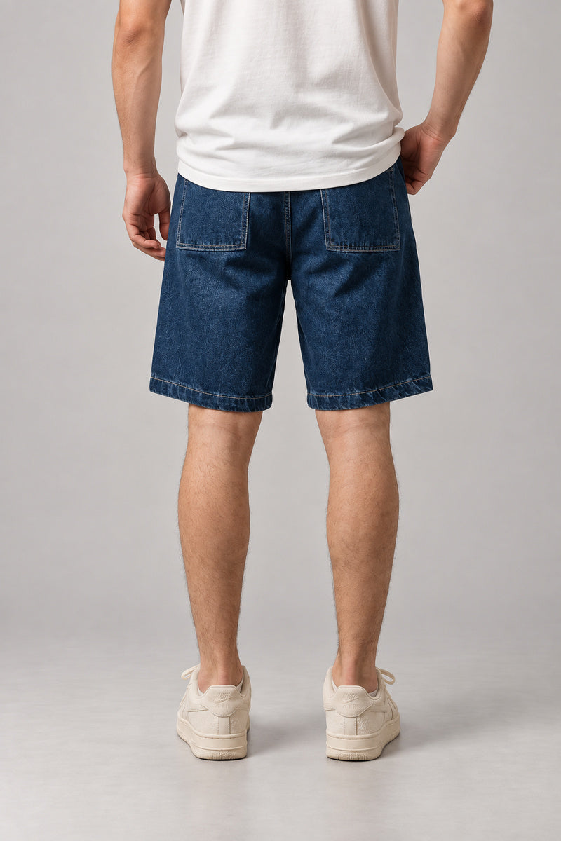 Raw Mid Blue Denim Shorts 'Kiji' – back view of the raw mid blue carpenter style denim shorts, on model