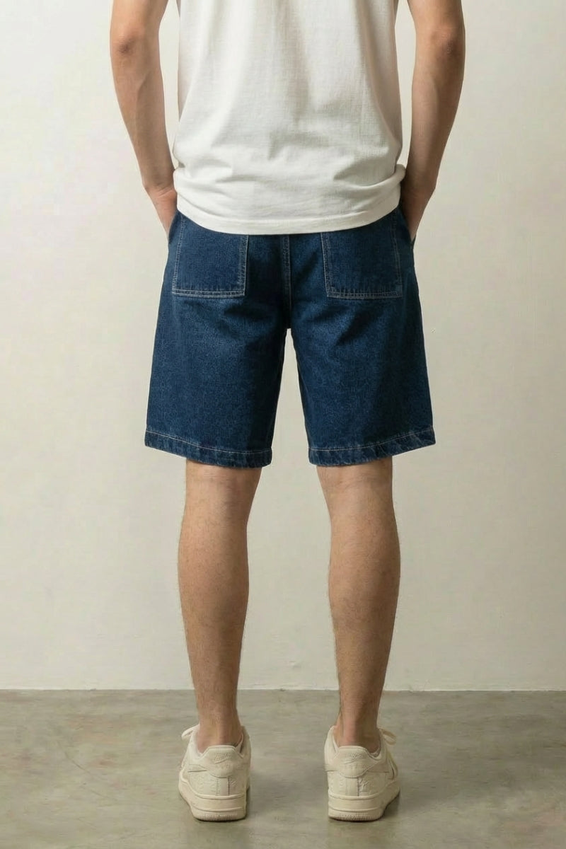 Raw Mid Blue Denim Shorts 'Kiji' – back view on model, studio