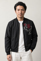 Red Dragon Japanese Bomber 'Sekiryu' – black bomber jacket with embroidered white and red dragon, Japanese streetwear, front view on model