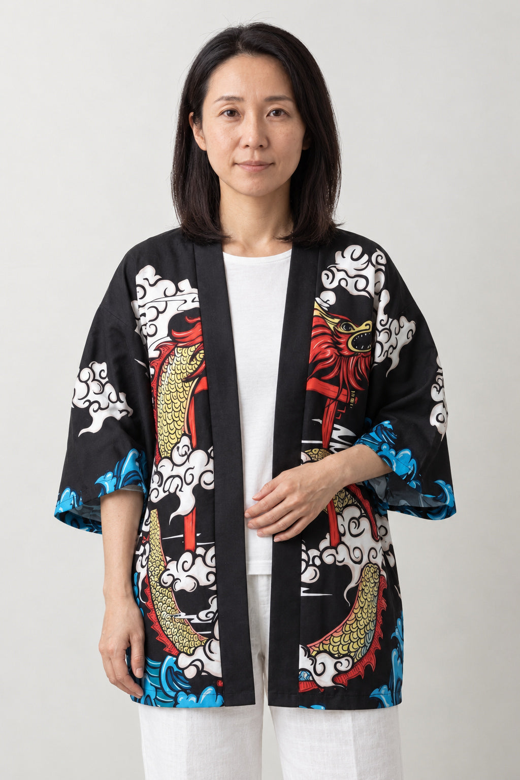 Red Dragon Kimono Cardigan 'Shinmon' – black women's kimono cardigan with red dragon, torii gate and cloud print, Japanese haori style jacket, front view on model
