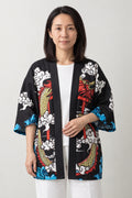 Red Dragon Kimono Cardigan 'Shinmon' – black women's kimono cardigan with red dragon, torii gate and cloud print, Japanese haori style jacket, front view on model