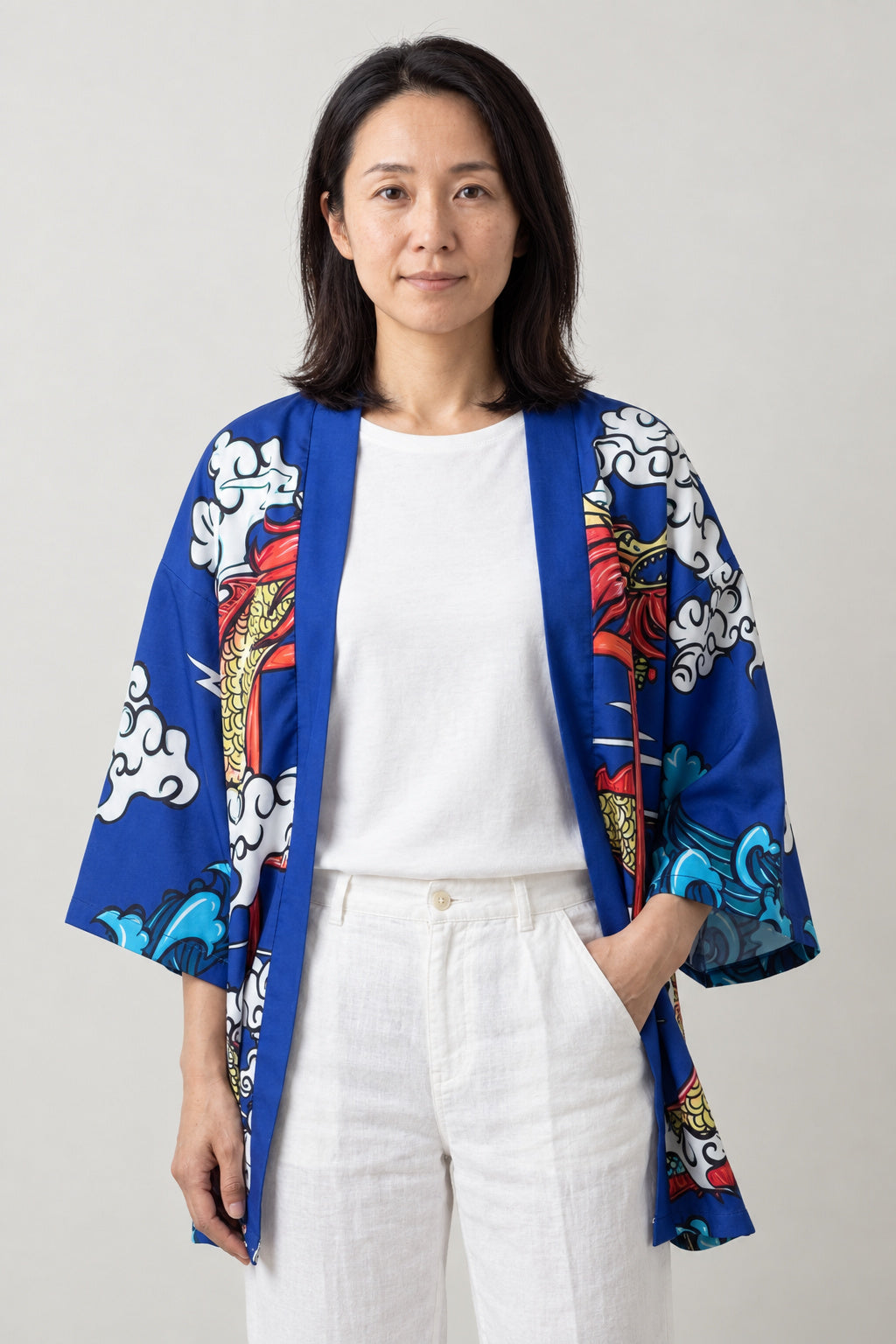Red Dragon Kimono Cardigan 'Shinmon' – blue version of the red dragon kimono cardigan with clouds and torii, front view on model